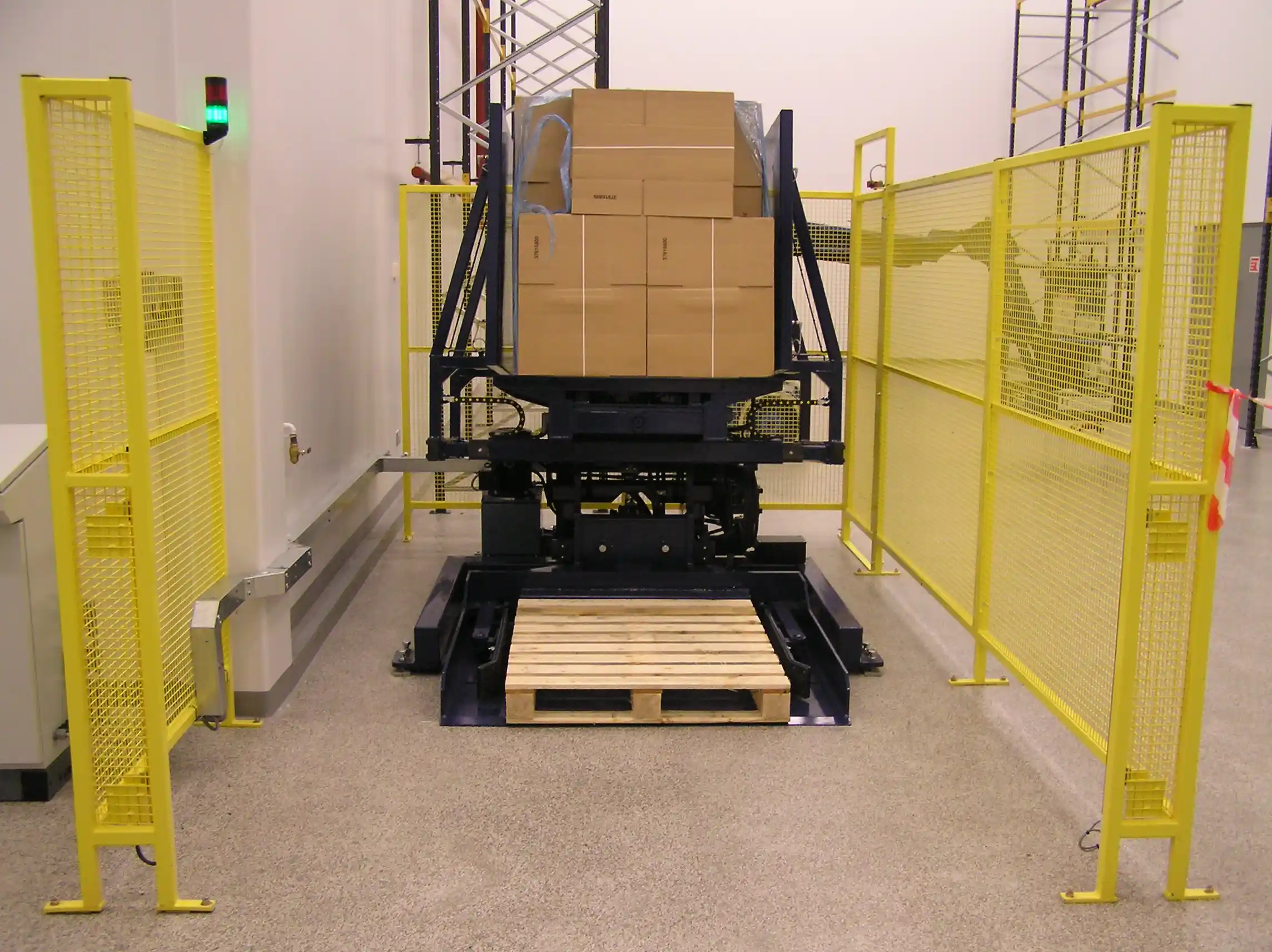 Pallet changer automatique sur fardeaux de cartons